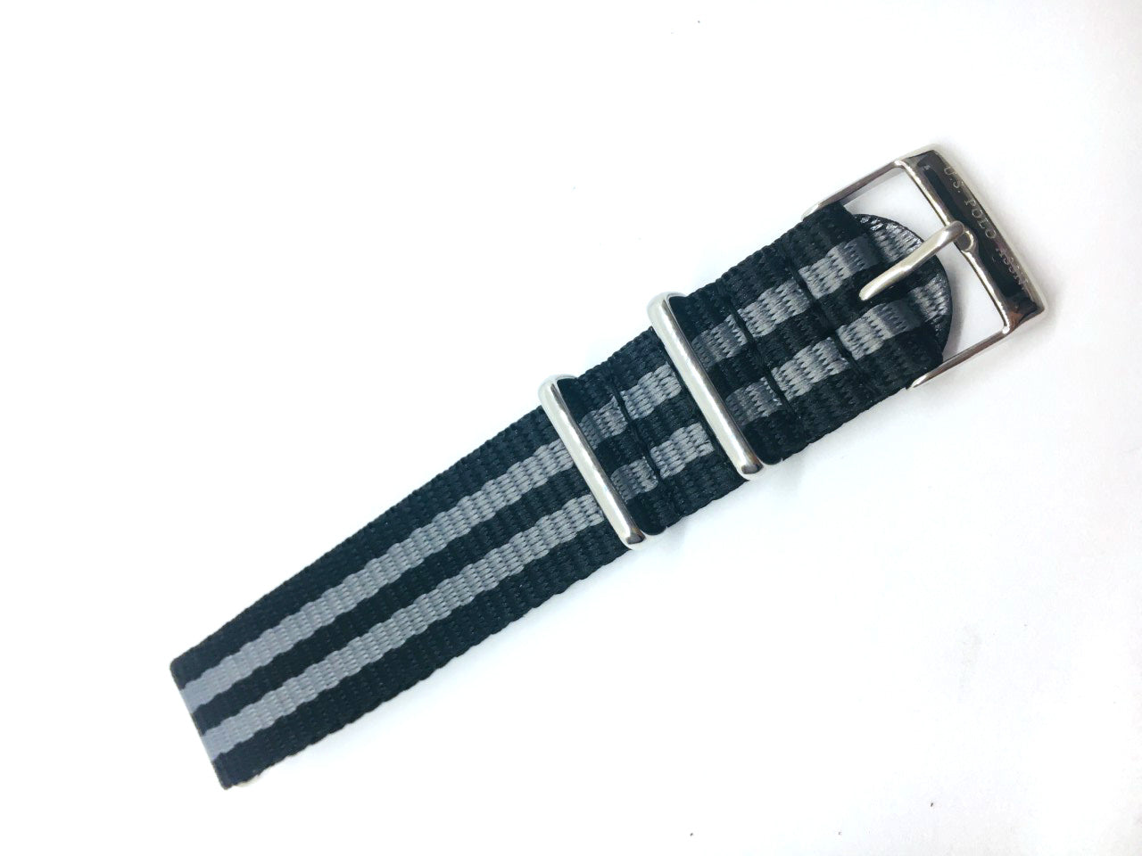 U.S. Polo Assn. 14-0306 watch for man with a dial and textile strap.